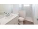 Modern bathroom with white vanity, quartz countertop, and marble shower at 159 Colony Point Dr, Punta Gorda, FL 33950