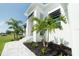 Landscaped walkway leading to the front entrance of a house at 159 Colony Point Dr, Punta Gorda, FL 33950