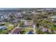 Aerial view of residential lot with single-Gathering home and pool at 1665 Manor Rd, Englewood, FL 34223