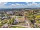 Aerial view of residential lot with single-Gathering home and pool at 1665 Manor Rd, Englewood, FL 34223