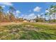 Single-story house exterior showcasing the back of the property at 1665 Manor Rd, Englewood, FL 34223