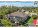 Home with pool, outdoor games, and lush landscaping at 17 Par View Pl, Rotonda West, FL 33947