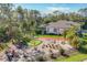 Large backyard with putting green and fire pit at 17 Par View Pl, Rotonda West, FL 33947