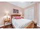 Cozy bedroom with a queen-size bed and built-in closet at 17 Par View Pl, Rotonda West, FL 33947