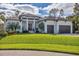 Two-story home with attached two-car garage at 17 Par View Pl, Rotonda West, FL 33947