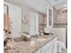 Elegant bathroom with granite countertop and walk-in shower at 17164 Canary Ln, Port Charlotte, FL 33948