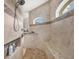 Spa-like bathroom with walk-in shower, built-in seat, and dual shower heads at 17164 Canary Ln, Port Charlotte, FL 33948