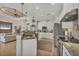 Modern kitchen featuring granite countertops and stainless steel appliances at 17164 Canary Ln, Port Charlotte, FL 33948