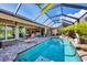 Expansive pool and patio with access to interior at 17164 Canary Ln, Port Charlotte, FL 33948