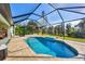 Inviting swimming pool with screened enclosure at 185 Cougar Way, Rotonda West, FL 33947