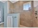 Bathroom with shower, tile flooring, and a modern vanity at 1900 Illinois Ave, Englewood, FL 34224