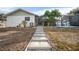 Steps leading up to the home's back porch at 1954 Arkansas Ave, Englewood, FL 34224