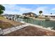 Steps leading to a waterfront dock at 1954 Arkansas Ave, Englewood, FL 34224