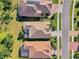 Bird's eye view of houses and neighborhood layout at 21228 Sandal Foot Dr, Venice, FL 34293