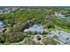 Aerial view of community pool and clubhouse at 21228 Sandal Foot Dr, Venice, FL 34293