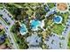 Aerial view of community pool and surrounding amenities at 21228 Sandal Foot Dr, Venice, FL 34293