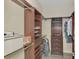 Large walk-in closet with ample shelving and hanging space at 21228 Sandal Foot Dr, Venice, FL 34293