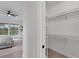 Large walk-in closet with white shelving at 22 Windward Rd, Placida, FL 33946