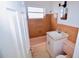 Bathroom with pink tub and brown tile at 22326 Midway Blvd, Port Charlotte, FL 33952