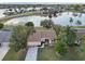 Aerial view showcasing home's location on a lake at 2365 Malaya Ct, Punta Gorda, FL 33983