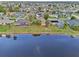 Wide aerial view of community by the lake at 2365 Malaya Ct, Punta Gorda, FL 33983