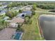 Aerial view of home, pool, and lakefront property at 2365 Malaya Ct, Punta Gorda, FL 33983