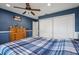 Bedroom with dresser, double closets and wood flooring at 2365 Malaya Ct, Punta Gorda, FL 33983