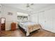 Bedroom with wood flooring and ceiling fan at 2365 Malaya Ct, Punta Gorda, FL 33983