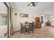 Cozy dining area with round table and four chairs near sliding doors at 2365 Malaya Ct, Punta Gorda, FL 33983