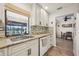 Modern kitchen with granite countertops and view of the backyard at 2365 Malaya Ct, Punta Gorda, FL 33983