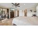 Spacious main bedroom with king bed and access to bathroom and patio at 2365 Malaya Ct, Punta Gorda, FL 33983