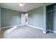 Bright bedroom with carpeted floor and spacious closet at 2462 Ensenada Ln, North Port, FL 34286