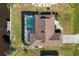 Top-down view of single-Gathering home and pool at 2483 Dixon Ter, Port Charlotte, FL 33981