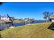 Landscaped waterfront property with private dock at 2483 Dixon Ter, Port Charlotte, FL 33981