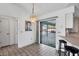 Dining area with pool view and kitchen access at 2483 Dixon Ter, Port Charlotte, FL 33981