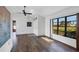 Living room features wood-look floors and a view to backyard at 2483 Dixon Ter, Port Charlotte, FL 33981