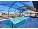 Relaxing screened pool with canal views and covered lanai at 2483 Dixon Ter, Port Charlotte, FL 33981