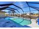 Relaxing screened pool and patio area with water views at 2483 Dixon Ter, Port Charlotte, FL 33981