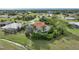 Aerial view of the house highlighting its pool and private backyard at 26266 Barcelos Ct, Punta Gorda, FL 33983