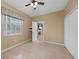 Bedroom with double closet and view into living room at 26266 Barcelos Ct, Punta Gorda, FL 33983