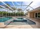 Large screened pool and spa with open-air feel at 26266 Barcelos Ct, Punta Gorda, FL 33983