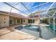 Resort-style pool and spa with covered patio at 26266 Barcelos Ct, Punta Gorda, FL 33983