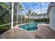 Relaxing screened pool and patio area at 26266 Barcelos Ct, Punta Gorda, FL 33983