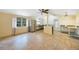 Kitchen features stainless steel appliances and tile flooring at 272 Cedar St, Englewood, FL 34223