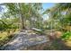 Covered outdoor workspace with gravel flooring at 272 Cedar St, Englewood, FL 34223