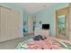 Bright bedroom with a TV and large closet at 2864 Mill Creek Rd, Port Charlotte, FL 33953