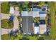 Aerial view showing the house layout, landscaping, and driveway at 2871 13Th St, Englewood, FL 34224