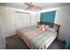 Bedroom with double bed and teal curtains at 4064 Harbor Blvd, Port Charlotte, FL 33952