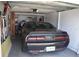 Garage with car and additional storage space at 4064 Harbor Blvd, Port Charlotte, FL 33952