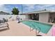 Relaxing rectangular pool with patio and lounge chairs at 4064 Harbor Blvd, Port Charlotte, FL 33952